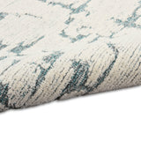 Sculptural Teal Wool Luxury Rug, available from Touched Interiors UK