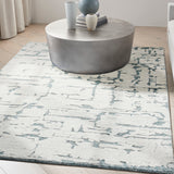 Sculptural Teal Wool Luxury Rug, available from Touched Interiors UK