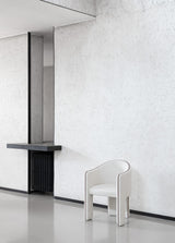 Siena curved chair in cream boucle in a minimalist interior