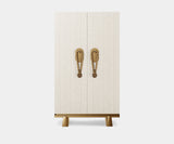The Private Label Tribe Cabinet, birdseye veneer, Emperador marble and aged brass, available from Touched Interiors UK