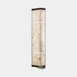 United Alabaster AD Geo Wall Light in natural alabaster, studio view on grey
