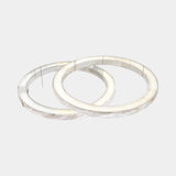 United Alabaster Halo Pendant Light in natural alabaster, set of two rings, studio view on grey