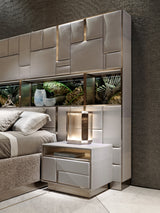 The Art of Sleep: The Beloved Art Bed by Visionnaire. This masterpiece combines a luxurious upholstered base with a captivating geometric headboard featuring integrated storage, artistic artwork, and LED lighting for a truly unique and inspiring sleep sanctuary.