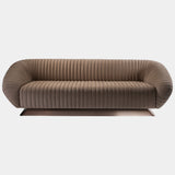 Visionnaire's Citizen Sofa: The epitome of modern luxury. This Italian-made sofa features a captivating canneté quilted design, plush Memory Foam® padding for ultimate comfort, and a variety of upholstery and metal base finish options for a truly personalised look.