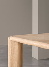 Meridiani Frank Dining Table, shown in light flamed oak, detail