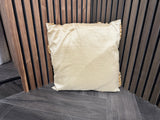 Back - Champagne Cushion with a Golden Fabric Mosaic Pattern is a striking piece that exudes opulence and sophistication.