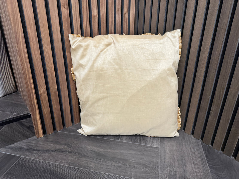 Back - Champagne Cushion with a Golden Fabric Mosaic Pattern is a striking piece that exudes opulence and sophistication.