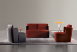 Meridiani Keeton Fit Armchair in burgundy velvet, shown with the Keeton Fit Sofa