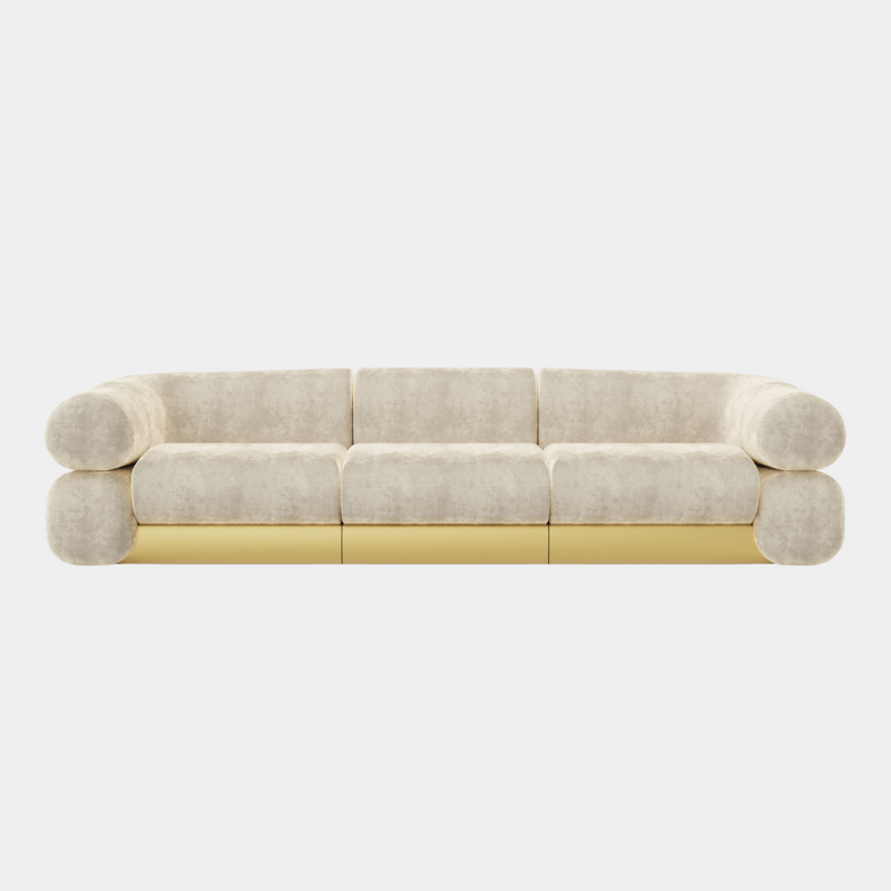 The Fitzgerald Sofa by Studiopepe. This oversized sofa with a low backrest and brass accents brings sophistication to any living space.