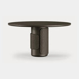 Dolmen Sienna Dining Table in black oak, hand-carved scalloped base