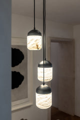 United Alabaster Glans Pendant Light in three natural alabaster shades with matt black caps
