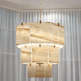 Luxury Chandelier with Onyx Shades: The Visionnaire Brando Chandelier features stunning lampshades crafted from hand-cut ivory onyx. This exquisite piece offers a mesmerizing play of light and shadow, perfect for creating a luxurious ambiance in your living room, bedroom, or reading nook.