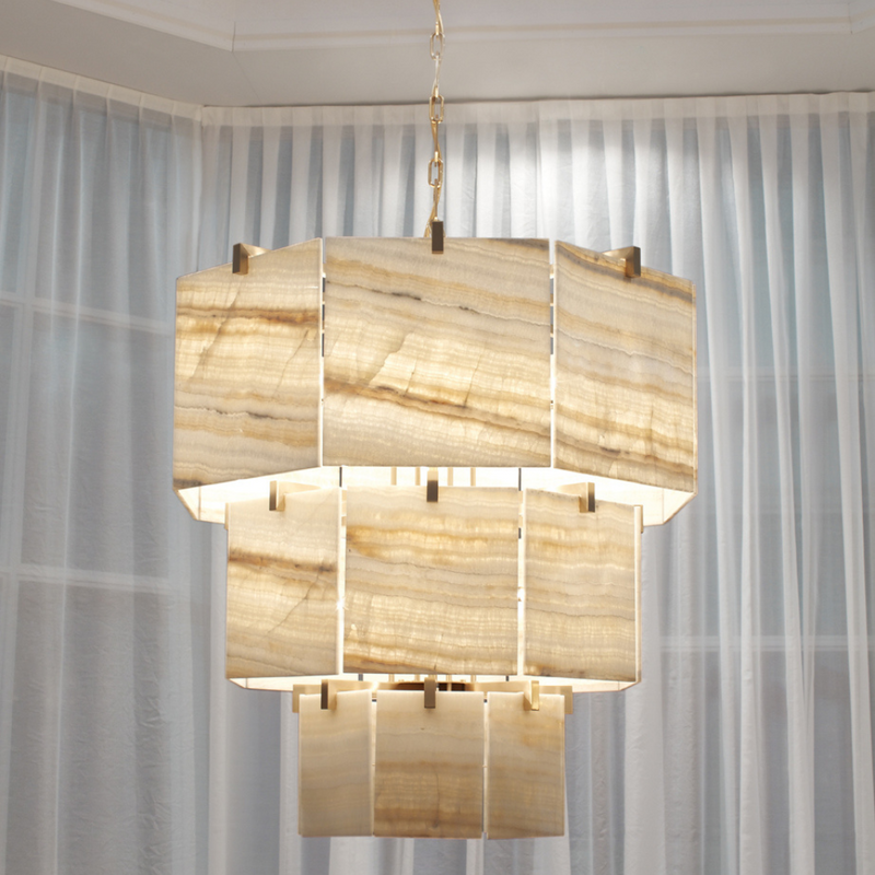 Luxury Chandelier with Onyx Shades: The Visionnaire Brando Chandelier features stunning lampshades crafted from hand-cut ivory onyx. This exquisite piece offers a mesmerizing play of light and shadow, perfect for creating a luxurious ambiance in your living room, bedroom, or reading nook.