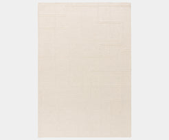 Ada Ivory luxury rug featuring a captivating geometric design perfect for high-end home decor.