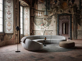 Albenga Curved Tube Luxury Ottoman in a room setting