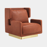 Alessio luxury statement armchair in rust leather on a satin brass plinth