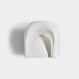 Plush cream velvet Amirah accent chair with brass accents, combining modern elegance and comfort.