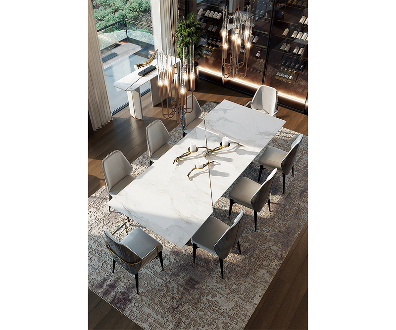 High-end dining table with Statuario marble top and brass details for luxury interiors