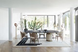 Ashford Oval Leather Base Luxury Dining Table styled in a luxury interior