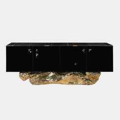 Boca do Lobo Angra Sideboard: Bold black lacquer sideboard with a striking hammered brass base and a luxurious Shara Noir marble top. A statement piece for modern luxury homes.