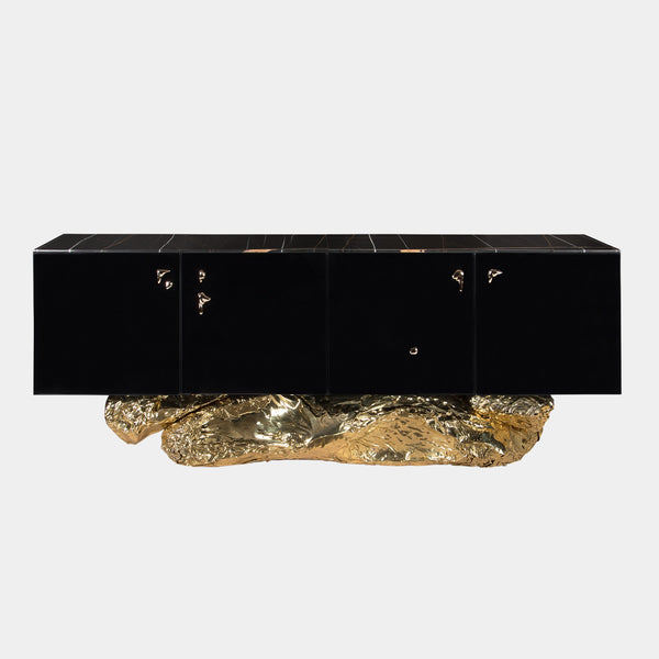 Boca do Lobo Angra Sideboard: Bold black lacquer sideboard with a striking hammered brass base and a luxurious Shara Noir marble top. A statement piece for modern luxury homes.