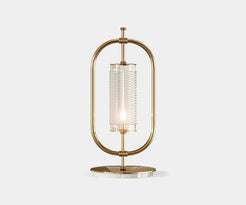  Beaumont: Minimalist Table Lamp in Gold-Plated Brass & Marble.  The Beaumont table lamp by Mezzo Collection embodies minimalist luxury.  This exquisite piece features a sleek oval frame in gold-plated brass and a Carrara marble base, casting a warm glow in any modern living space.