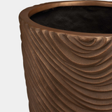Bertarelli Curved Wave Luxury Floor Vase, detail of the bronze wave relief
