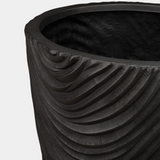 Bertarelli Curved Wave Luxury Floor Vase, detail of the black iron wave relief
