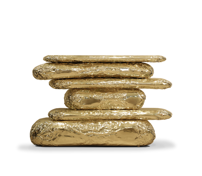 Boca Do Lobo Stonehenge Console: A luxurious console table inspired by Stonehenge, featuring brass and marble.