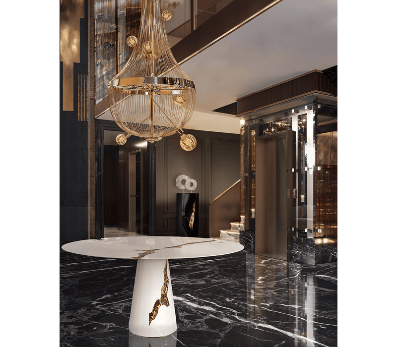A Play of Light and Shadow: The Boca do Lobo Lapiaz White Dining Table - The Boca do Lobo Lapiaz White Dining Table showcases a captivating interplay of light and shadow on its lacquered mahogany surface accented with polished brass. This white iteration offers a modern interpretation of the brand's signature design.