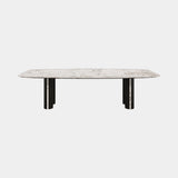 Casa Magna Pietra Dining Table, marble top with dark lacquered legs, available from Touched Interiors UK