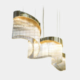 Castro Lighting Flow Snooker Suspension Lamp in gold-plated brass with clear glass, available from Touched Interiors UK