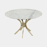 Castro Lighting Haring Dining Table in polished brass with a marble top, available from Touched Interiors UK
