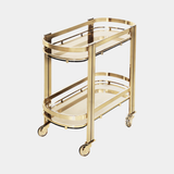 Castro Lighting Marie Tea Cart in polished brass with glass shelves, available from Touched Interiors UK