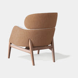 Celine Luxury Designer Armchair and Modern Curved Pouf styled in a luxury interior