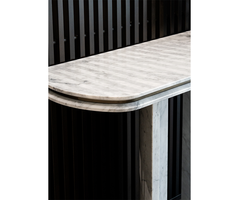 Sleek and modern marble console table for living rooms or entryways, elevating luxury decor.