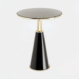 Castro Lighting Butler Side Table in polished brass with a black base, available from Touched Interiors UK