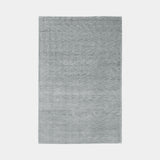 Hand-Woven Luxuriance Glam Rug in Aqua, a soft blue-grey