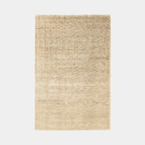 Hand-Woven Luxuriance Glam Rug in Gold, a warm golden beige