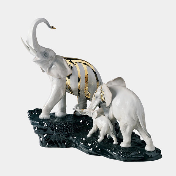 Gloss & Metallic Luster Elephants on Black Rock Figurine