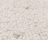 Abbus rug by Asiatic London in rich jewel tones, ideal for luxury bedroom decor.