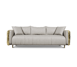 The Imperfectio Sofa by Boca Do Lobo: A celebration of Wabi-Sabi aesthetics. Hand-hammered brass and plush leather create a unique luxury piece.