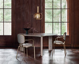 Jacopo Cast Frame Luxury Dining Armchair in a room setting