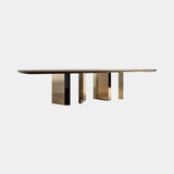 Amber Dining Table in dark wood veneer with aged gold sculpted legs