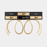 Ecstasy Console Table in black lacquer with gold leaf rings
