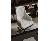 Designer Charla office chair with a sleek frame and soft leather seat in an executive setting.