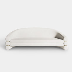 Luxury Hutton Sofa upholstered in cream velvet with brushed brass accents, perfect for modern high-end interiors.