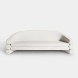 Luxury Hutton Sofa upholstered in cream velvet with brushed brass accents, perfect for modern high-end interiors.