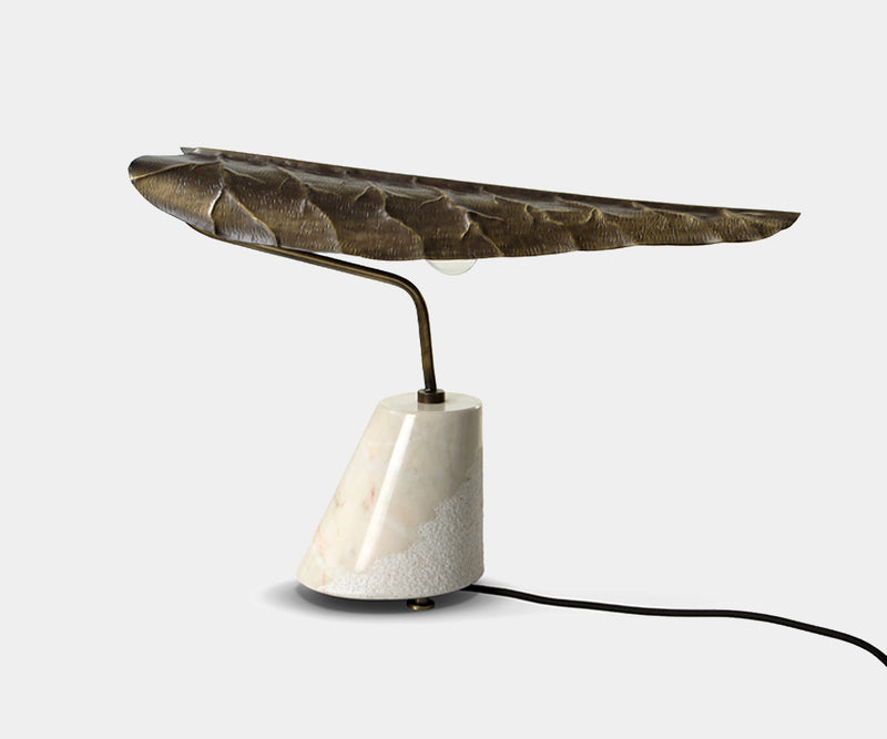 Contemporary table lamp with botanical design, perfect for living room decor.