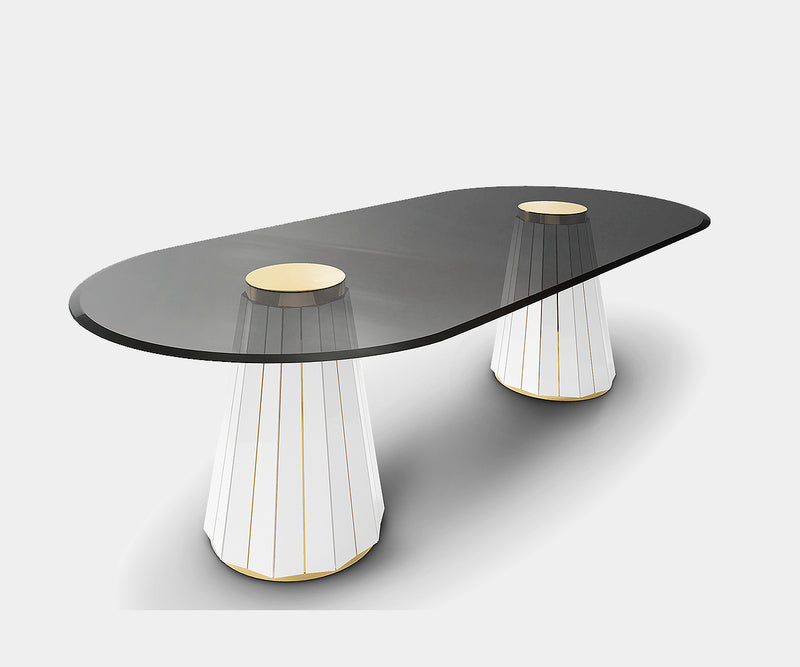 Contemporary oval dining table with walnut root, brass detailing, and smoked glass